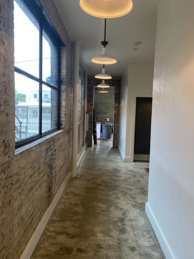 Freshly finished corridor connecting the café dining room with the rear service area